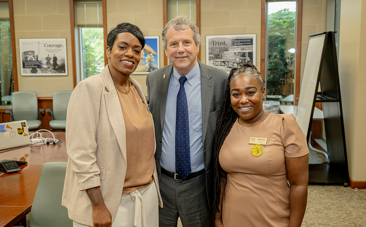 Marsita with Timeka Rashid and Sherrod Brown at a Baldwin Wallace partnership event